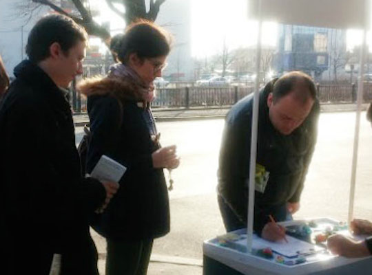 Image for article Romania: Lining Up to Sign for Falun Gong